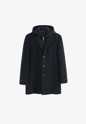 Marineblauer Wollmantel mit abnehmbarer Kapuze, einreihigem Design, zwei Fronttaschen und knopfbaren Manschetten. Verfügt über eine mit Reißverschluss versehenen Innenschicht.