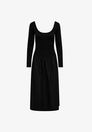 Juoda suknelė su ilgomis rankovėmis, plačiu apvaliu iškirpimu ir susiraukšlėta liemene. Lygus audinys, laisvas kirpimas, siekiantis iki vidurio blauzdų.