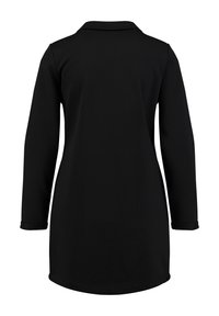 Black tunic dress with long sleeves and a collared neckline. Features a smooth texture and a slightly curved hem at the bottom.