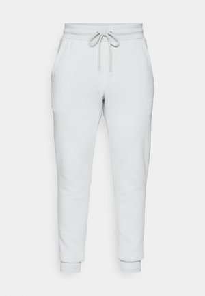 Light grey sweatpants with a drawstring waist, side pockets, and ribbed cuffs. Made of soft fabric with a smooth texture.
