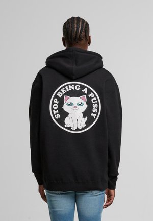 Black hoodie with white graphic featuring a cartoon cat. Text reads "STOP BEING A PUSSY," round design, relaxed fit, cotton blend material.