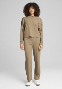 Puma ELEVATED WAIST  - Spodnji deli trenirk - oak branch