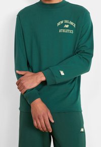 New Balance Långärmad tröja - dark green