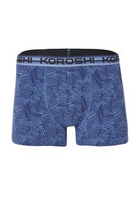 Blaue Boxershorts mit geometrischem Muster, ausgestattet mit einem schwarzen Bund mit der Aufschrift "KOROSHI" und weichem, dehnbarem Material. Klassisches Fit-Design.