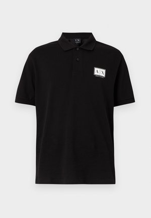 Polo nera a maniche corte con abbottonatura a due bottoni e logo bianco A|X Armani Exchange sul petto a sinistra.