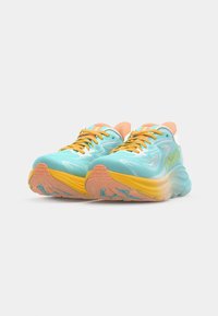 Hoka running shoes with a turquoise mesh upper, orange accents, yellow midsoles, and a textured rubber outsole. Lightweight and cushioned design.