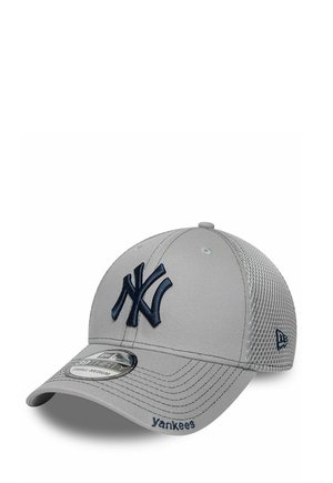 Gray New York Yankees cap with navy logo on front, mesh back panels, and "Yankees" embroidered on the curved brim.
