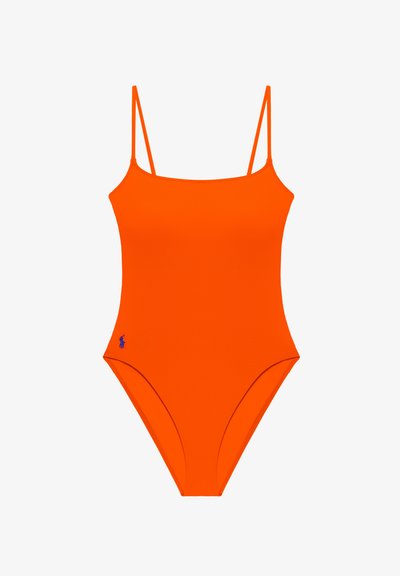 Πορτοκαλί ολόσωμο μαγιό με λεπτούς ιμάντες στους ώμους και μικρό μπλε λογότυπο στο κάτω αριστερό μέρος.