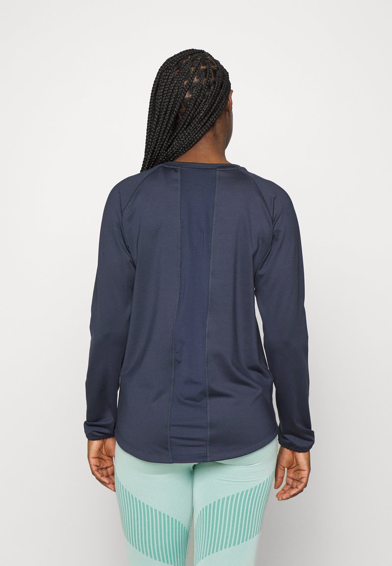 Damen Sportbekleidung | Puma RUN FIRST MILE MIDLAYER Sport T-shirt parisian night/dunkelblau - HT60842 Damen Sportbekleidung | Puma RUN FIRST MILE MIDLAYER Sport T-shirt parisian night/dunkelblau - HT60842