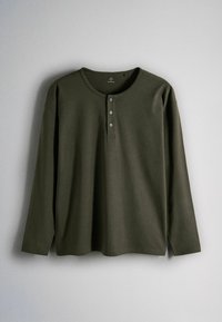Dark green long-sleeve henley shirt with three front buttons, displayed against a light gray background.
