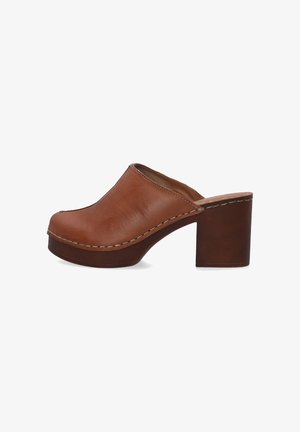Brown leather clog with a rounded toe, white stitching along the edges, and a chunky brown high heel. Smooth texture.