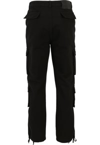 Pantaloni cargo negri cu multiple buzunare laterale, croială dreaptă și șireturi reglabile la gleznă, realizați dintr-un material durabil din amestec de bumbac.