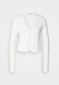 Cardigan court blanc avec manches longues, col en V profond et une fermeture par un seul bouton à l'avant.