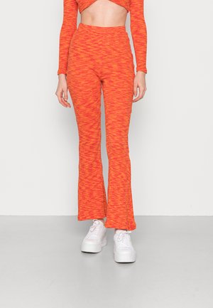 SPACE PANTS - Calças - red/orange