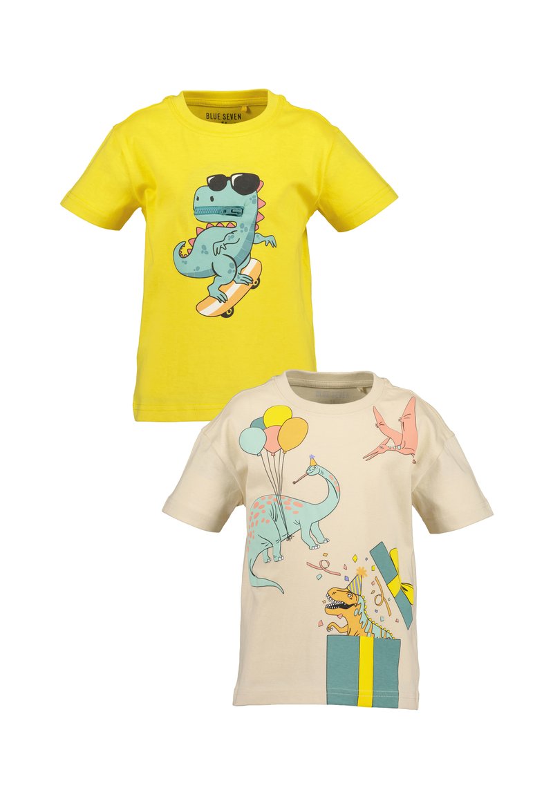 Ensemble de deux t-shirts pour enfants : l'un jaune avec un graphisme de dinosaure, l'autre beige avec des illustrations de dinosaures colorés et des ballons.