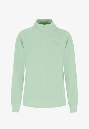 Svijetlozelena, rebrasta majica s kratkim patentnim zatvaračem, visokim ovratnikom i dugim rukavima, s malim logotipom na prsima. Mekana tekstura.