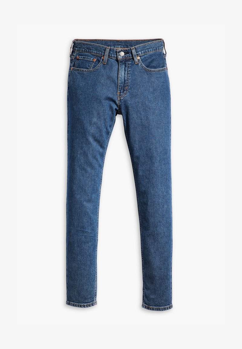 Jeans in denim blu con una vestibilità slim, design a cinque tasche e orlo grezzo alle caviglie. Presentano accessori in bronzo e dettagli di cucitura arancione.