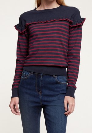 Marineblauwe en bordeaux gestreepte trui met ruches en een effen halslijn, gemaakt van gebreid materiaal met een getailleerde taille.