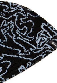 Black beanie featuring a woven light blue abstract pattern, with a small Vans logo tag on the side. Soft knit fabric, close-fitting design.