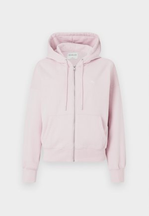 Lys pink zip-up hættetrøje med frontlommer, snørehætte og lange ærmer, præsenteret på en hvid baggrund.