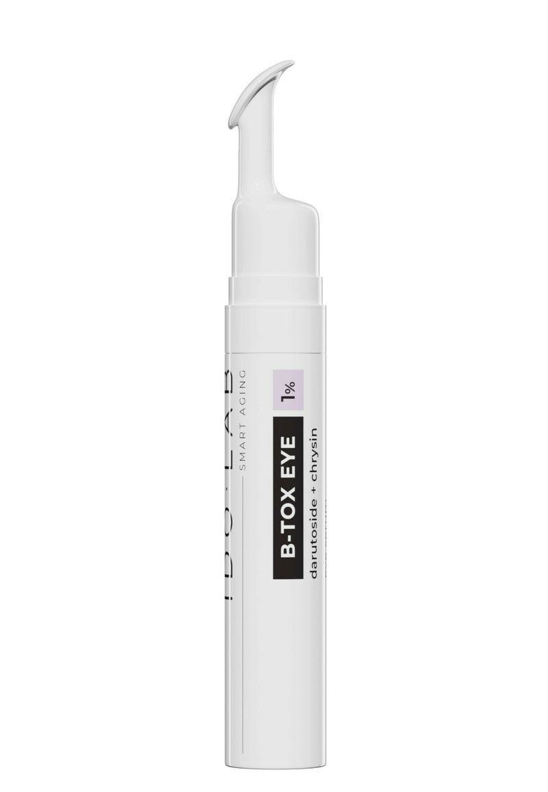 Weiße zylindrische Flasche mit einer geschwungenen Applikatorspitze. Das Etikett enthält schwarze und lila Schrift, die den Produktnamen und die Inhaltsstoffe beschreibt.