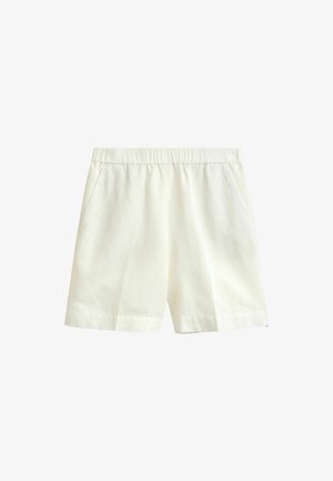 Shorts blancs décontractés avec taille élastique et poches latérales, fabriqués en tissu léger.