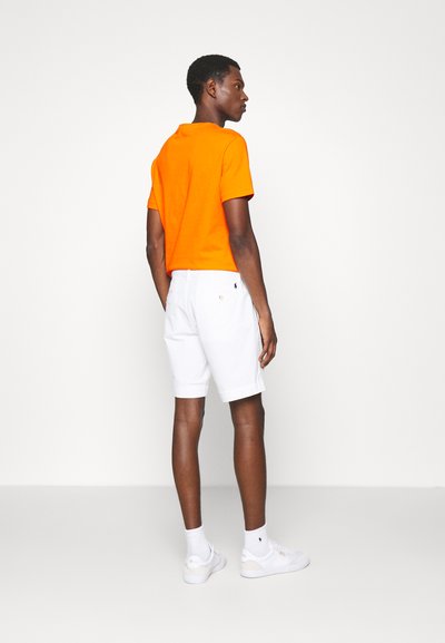 Polo Ralph Lauren 8-INCH STRETCH STRAIGHT FIT CHINO SHORT - Calções - pure white