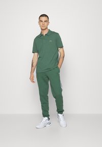 Lacoste Sport KURZARM - Polo - vert fonce