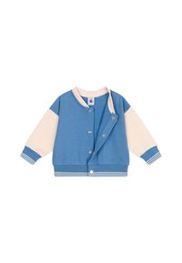 Modrá a krémová varsity bunda s dlhými rukávmi, gombíkmi a pruhovaným lemom. Má mäkký materiál a kontrastné rukávy.