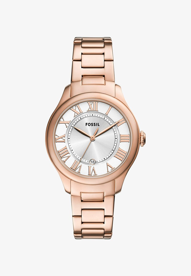 Montre Fossil en or rose avec un boîtier rond, un cadran blanc, des chiffres romains et un bracelet à maillons. Dispose d'un affichage de la date à 6 heures.