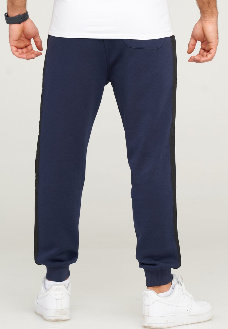 Herren Trainingsanzüge | Jack & Jones JCOHARRY Jogginghose navy blazer/dunkelblau - LC04410 Herren Trainingsanzüge | Jack & Jones JCOHARRY Jogginghose navy blazer/dunkelblau - LC04410