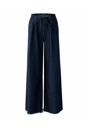 Weite, dunkelblaue Jeans mit einem Zugbandbund, fransigem Saum und auffälligen Seitentaschen. Strukturiertes Material mit Nahtdetails.