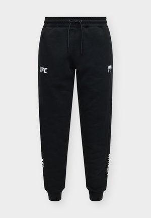 Venum, UFC UNITY BY VENUM FIGHT WEEK - Долнище на анцуг - black/white