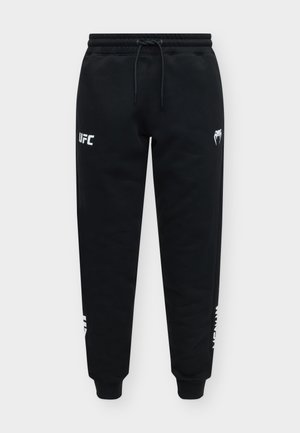 Venum, UFC UNITY BY VENUM FIGHT WEEK - Долнище на анцуг - black/white