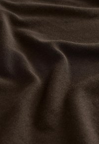 Dark brown fabric texture with soft, smooth surface and subtle wrinkles, indicating a lightweight, flexible material.