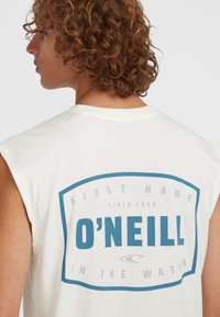 White sleeveless t-shirt featuring a blue graphic print with the text "O'NEILL" and "FIRST NAME IN THE WATER" along with a logo detail.