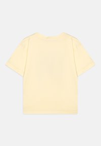 Calvin Klein Jeans MONOGRAM GRID RELAXED - Marškinėliai su spaudiniu - afterglow