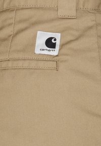 Carhartt WIP MASTER PANT - Calças - leather