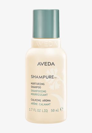 Butelka odżywczego szamponu Aveda Shampure, 50 ml, z kojącym aromatem, beżowy pojemnik i zielona nakrętka, kwiatowy wzór na etykiecie.
