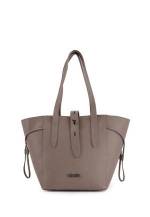 Gray leather tote bag with two long handles, a snap closure, and a front logo detail. Features a structured shape and side drawstrings.