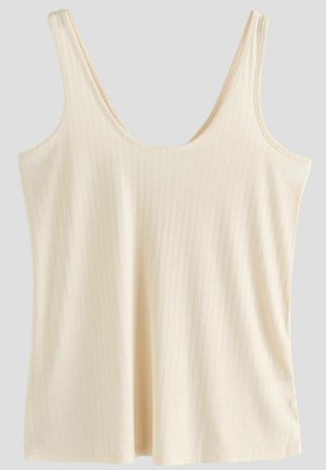 Crème tanktop van ribstof, met een scoopneck, dunne schouderbandjes en een relaxte pasvorm. Soepele textuur met een lichte glans.