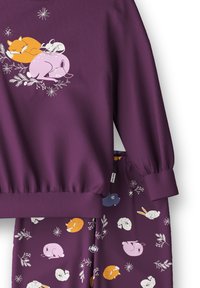 Paarse lounge set met een sweatshirt met dierenprints en bijpassende broek. Gemaakt van zachte stof, inclusief geribbelde boorden en tailleband.