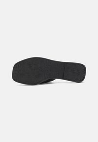 Tamaris Platt slip-in - black