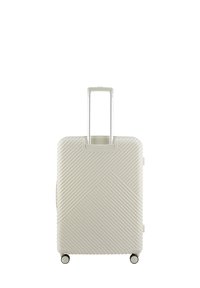 Valise rigide blanche avec des stries diagonales, poignée rétractable et quatre roues roulantes pour la maniabilité.