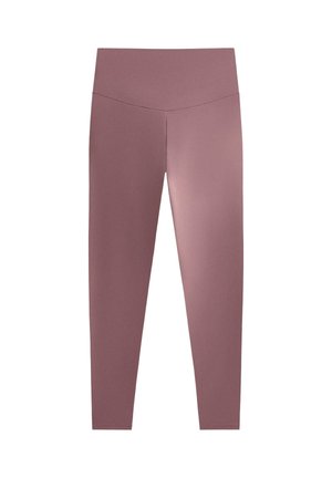 Leggings visokog struka u umirujućoj mauve boji, izrađeni od mekanog, rastezljivog materijala. Imaju glatku teksturu i bešavni dizajn, bez uzoraka ili naglasaka.