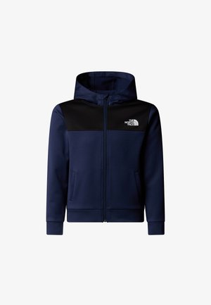 Sweat à capuche zippé bleu marine avec panneau noir aux épaules, poches avant et logo The North Face sur le côté gauche. Tissu doux et texturé.