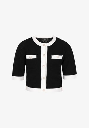 Schwarze, strukturierte Kurzarm-Strickjacke mit weißer Paspelierung, perlenverzierten Knöpfen und zwei vorderen Taschen mit Knopfklappen.