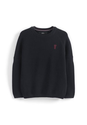 Czarny dziany sweter z okrągłym dekoltem, z żebrowanymi ramionami i mankietami, z małym czerwonym emblematem homara na lewym piersi.