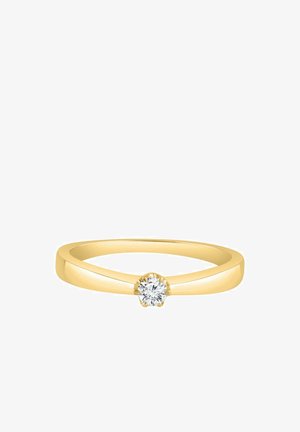 Anello d'oro con fascia liscia, caratterizzato da un diamante rotondo centrale incastonato in una montatura a sei punte. Design semplice ed elegante.