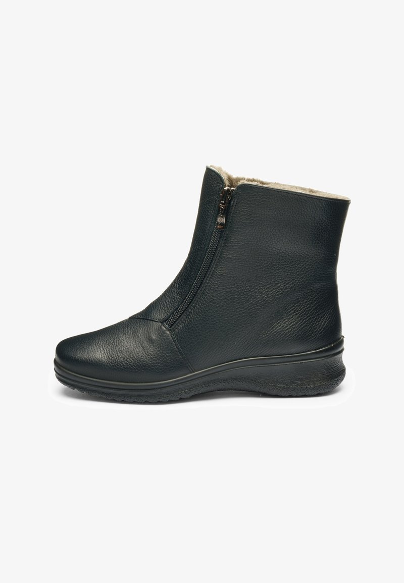 Black ankle boot with side zipper, textured leather exterior, cushioned sole, and soft beige inner lining.